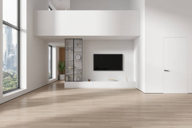 istock Luxury home living room interior with tv screen, shelf and panoramic window 1896825869