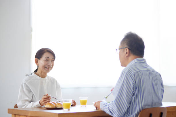 istock Japanese senior couple eating breakfast 1896831025