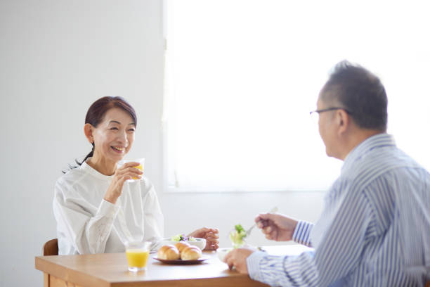 istock Japanese senior couple eating breakfast 1896831027