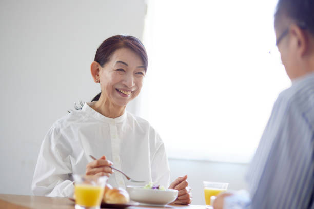 istock Japanese senior couple eating breakfast 1896831030