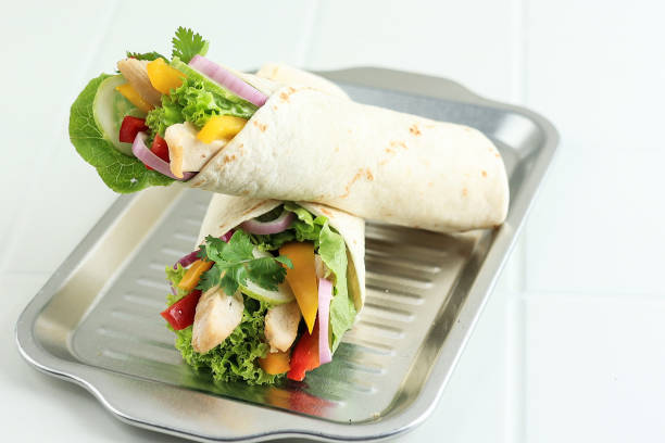 istock Tortilla Chicken Wrap with Fresh Vegetable 1896887929