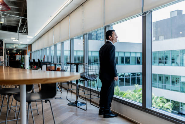 istock Businessman contemplating on the office 1896951238