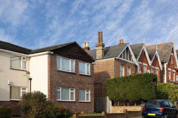 istock View showing the fronts of several town houses 1897011767
