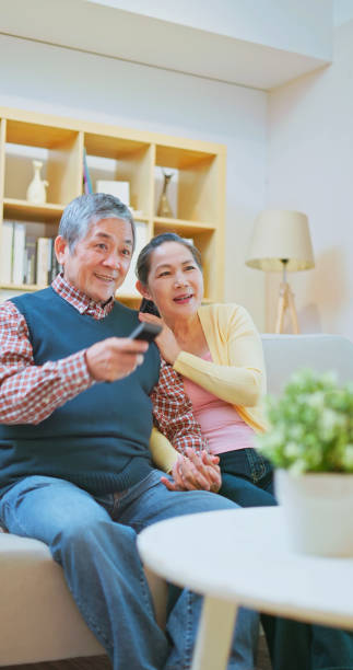 istock old couple watch tv 1897019671