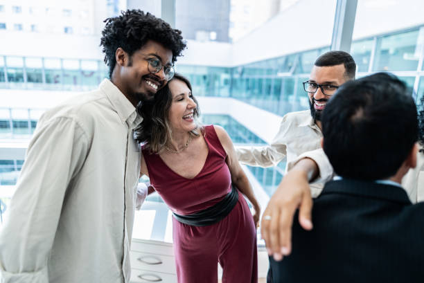 istock Coworkers celebrating on the office 1897057511