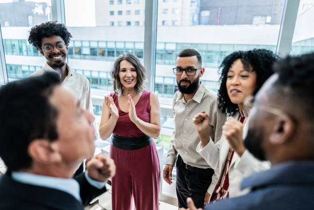istock Coworkers celebrating on the office 1897084611