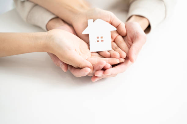 istock A dream home that fits in your hand, a couple's future plan 1897096100