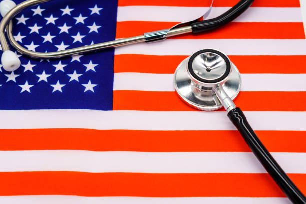 istock Patriotic Healthcare: A High-Quality Image of a Stethoscope on the American Flag Representing the Intersection of National Pride and Medical Excellence 1897106764