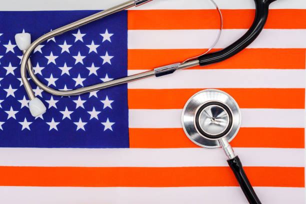 istock Patriotic Healthcare: A High-Quality Image of a Stethoscope on the American Flag Representing the Intersection of National Pride and Medical Excellence 1897106768
