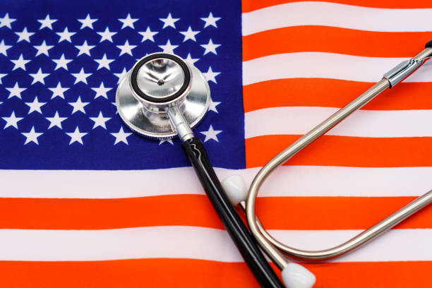 istock Patriotic Healthcare: A High-Quality Image of a Stethoscope on the American Flag Representing the Intersection of National Pride and Medical Excellence 1897106785