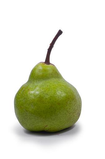 Pear isolated. One whole green pear on white background.