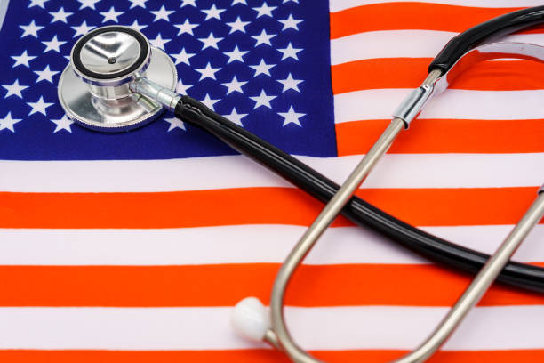 istock Patriotic Healthcare: A High-Quality Image of a Stethoscope on the American Flag Representing the Intersection of National Pride and Medical Excellence 1897107843