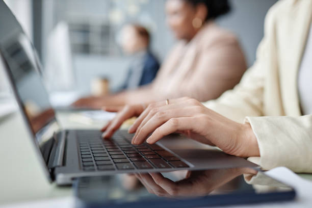istock Businesswoman Typing on Laptop Keyboard 1897108417