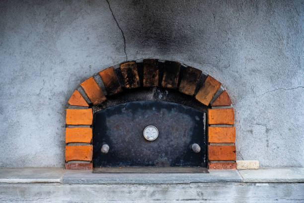 Well used pizza oven in stone.