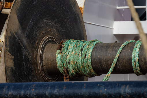 Spiral rope in a wood pier.