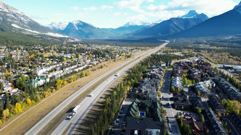 Aerial view of Trans-Canada Highway (Highway 1) exit 89 to Downtown Canmore in Canadian Rockies, Alberta, Canada.