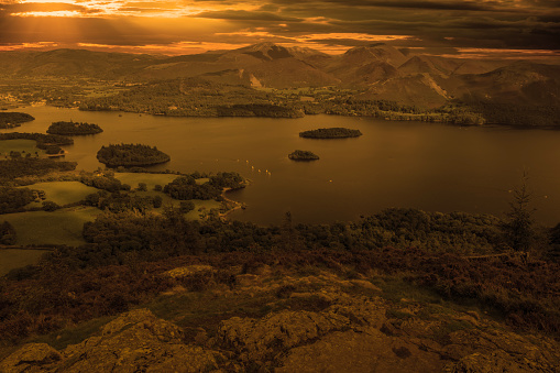 Digital composite sunset shot from Walla Crag, a viewpoint just south of Keswick overlooking Derwent Water in the Lake District of Cumbria, England.