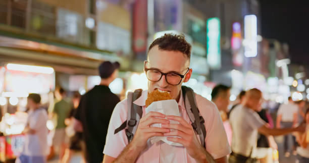 istock man visit the night market 1897291097