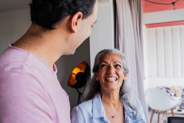 istock Mother and son talking at home 1897305667