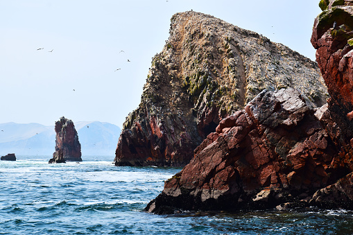 View of rock formations and wildlife at the Ballestas Island in Paracas national Park in Peru