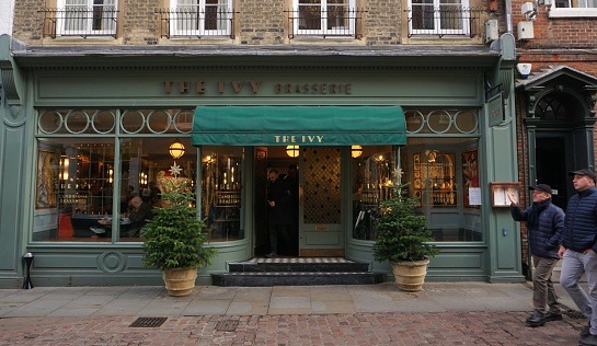 Cambridge, England - 26 December 2023: Frontage of the Ivy Brasserie, a well known dining place in central Cambridge.