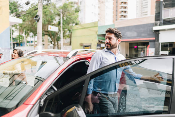 istock Mature man getting out of the car 1897419476