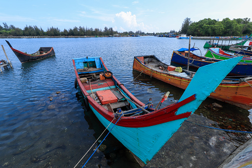 Aceh traditional boat with blue sky at Ulee Lheue beach, Banda Aceh