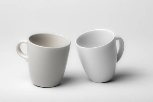 istock Mockup of a two different coffee cups, isolated, on a plain background, ready to overlay designs or logos for merchandising 1897644346