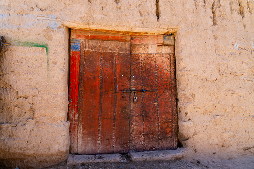 Door in adobe building in Erfoud, Morocco