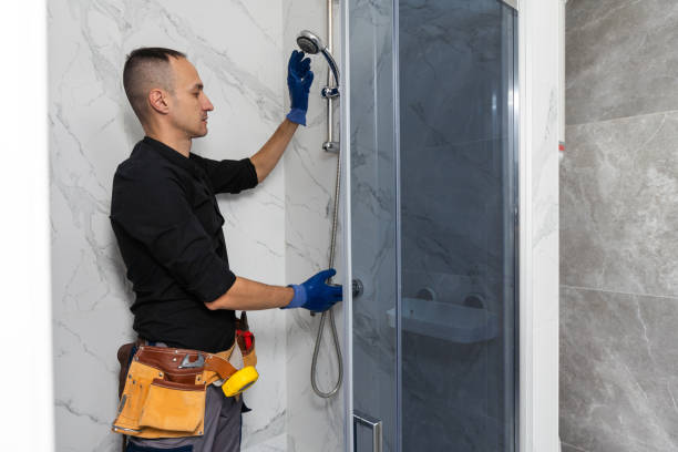 istock Professional handyman working in shower booth indoors 1897791274