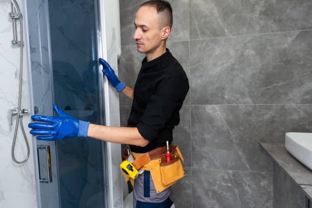 istock Professional handyman working in shower booth indoors 1897794328