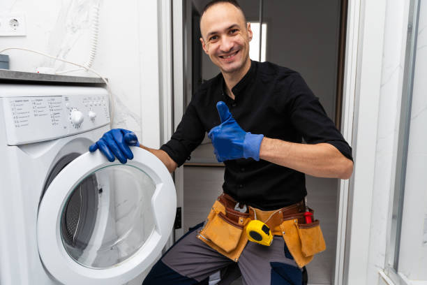 istock studio photo of washing machine repairman 1897803014