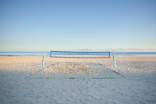 Beach volleyball is a team sport played by two teams of two or more players on a sand court divided by a net.
