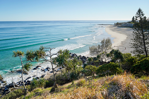 Rainbow Bay is at the southern end of the Gold Coast. This pristine white sand beach arches between Greenmount and Snapper Rocks. Sheltered from the southerly breezes and patrolled year-round, laid-back Rainbow Bay is popular with families and swimmers.