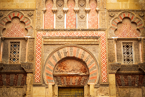 Detail shot of the southwest façade, next to the Puerta de San Sebastián of the lavishly decorated Mosque of Córdoba, Andalusia, Spain
