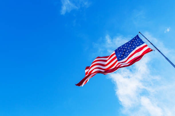 istock USA American Flag Waving. CLOSE UP 1897908162