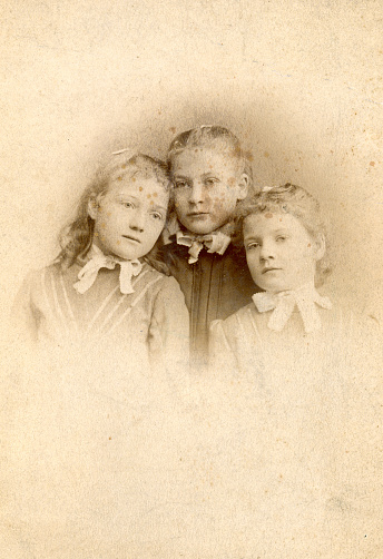 Photograph of three sisters taken in the 1880s.   Lovely photo with browning spots.