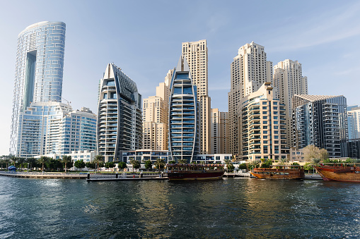 Dubai Marina skyscrapers, port with luxury yachts and Marina promenade, Dubai United Arab Emirates
