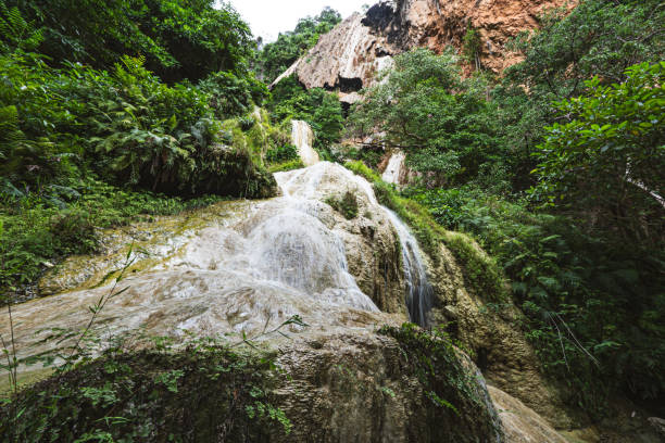 landscape view of erawan waterfall kanchanaburi thailand. erawan national park is most popular falls in thailand. - erawan national park beauty in nature waterfall photos et images de collection