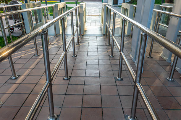 istock Electronic turnstile. Access system to building. Pass through the passes. Security systems for rooms. Several turnstiles are installed nearby. Check Point. Automatic checkpoint. Building security. 1898224060
