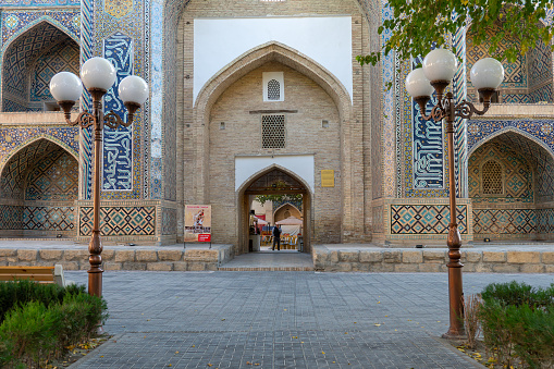 Madrasah Nodir-Divan-Begi is part of the architectural ensemble of the 16th-17th centuries Lyabi-Khauz, Bukhara. Uzbekistan. October 31, 2023.