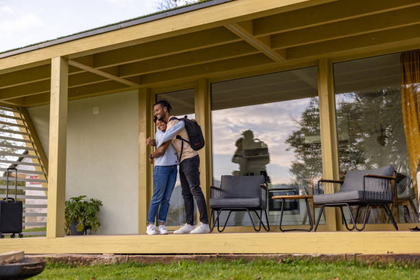 istock Diverse Young Adult Couple Hugging On A Weekend Getaway 1898252172