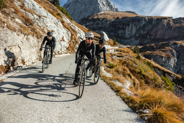 istock Passionate Cyclists Pedaling Into the Sunset 1898255958