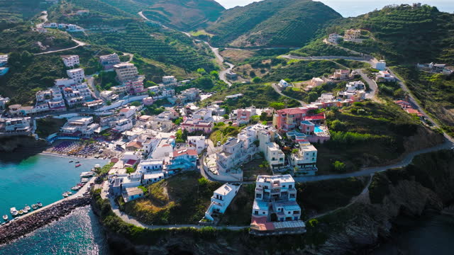 Aerial view of tourist resort hotels and Livadi Beach in Crete, Greece.