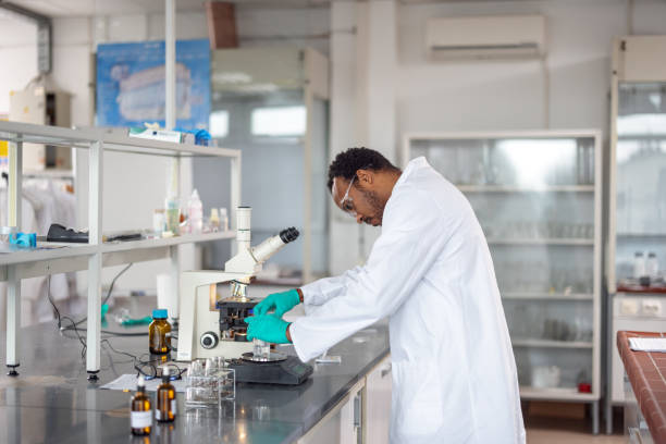 istock Dark-Skinned Male Scientist Working Concentrated At A Laboratory 1898269445