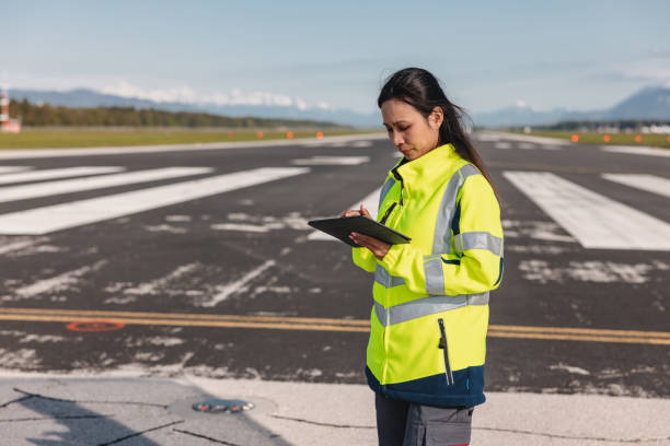 istock A Female Aircraft Engineer Checking Her Digital Tablet 1898275192