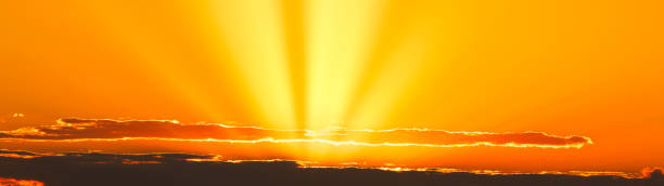 istock Dawn's First Light: Painting the Sky with Illuminated Clouds 1898311415