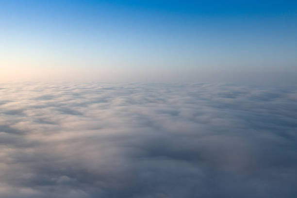 Heavenly Horizons: Dawn's Palette Above the Enchanting Clouds