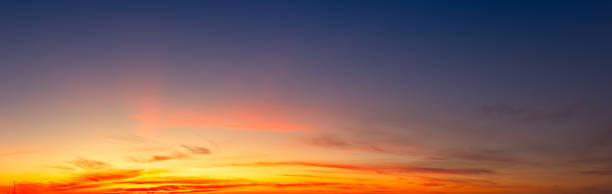 istock Golden Horizons: A Sky of Azure and Tangerine 1898311462