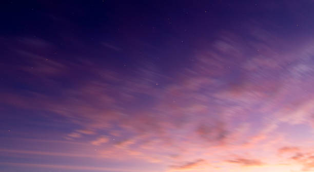 istock Celestial Dreams: Clouds Dance with the Glowing Stars 1898311466